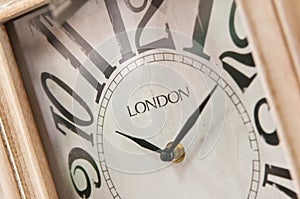 Wooden clockface with London inscription