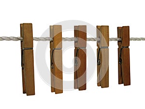 Wooden clothespins on a clothes line (+ clipping path)