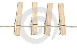 Wooden clothespins on clothesline