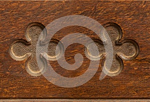 Wooden cloverleaf shaped indent pattern seamlessly tileable