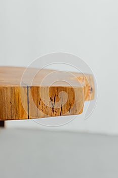 Wooden coffee table made of epoxy resin. In the room. Oak tree