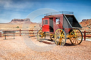 Wooden colorful caravan with Monument Valley view on a sunny summer day