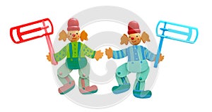 Wooden colorful clowns and plastic noisemaker