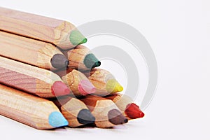 Wooden colorful ordinary pencils isolated on a white background