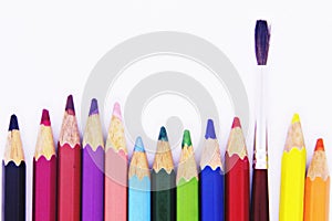 Wooden colorful ordinary pencils isolated on a white background