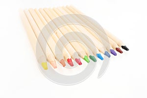 Wooden colorful pencils isolated on white