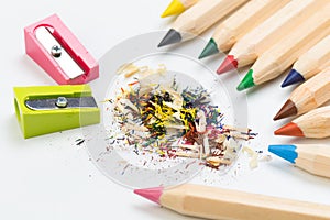 Wooden colorful pencils isolated on a white background, pencil sharpeners