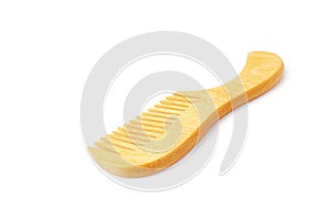 Wooden comb brush isolated over white