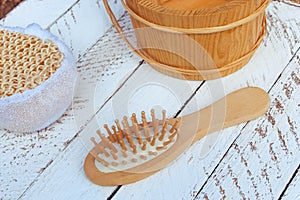 Wooden comb, bucket and bath sponge