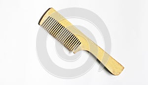 A wooden comb isolated on white background