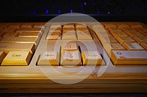 Wooden computer keyboard arrow keys in detail
