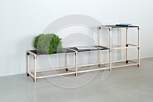 Wooden construct with black tabletops photo