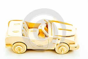 wooden construction light brown kids car on white