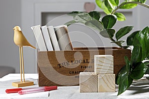 Wooden container with books,