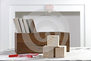 Wooden container with books,