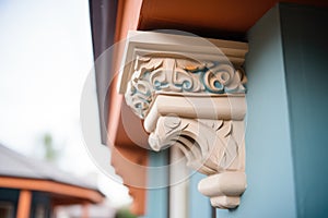 wooden corbels, pueblo home faade detail photo