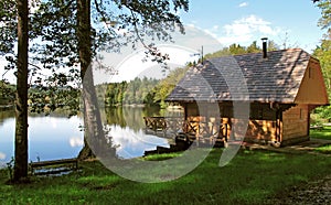 Wooden cottage by the lake