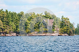 Wooden cottage on the lake