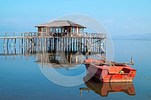 Wooden cottage lake settlement