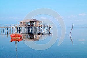 Wooden cottage lake settlement