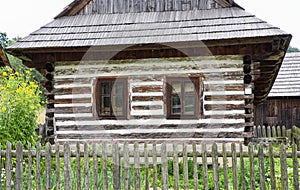Wooden cottage in village