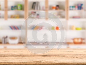 Wooden counter with kitchen cabinet background