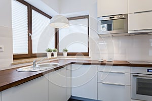 Wooden countertops in traditional kitchen