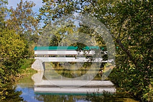 A Wooden Covered Bridge in the countyside of rural America