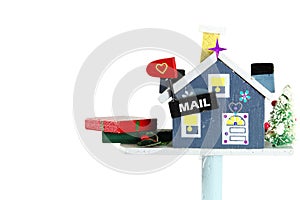 Wooden craft house mailbox with gift box of holiday