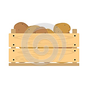 Wooden crate with potatoes