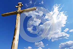 Wooden Cross Against a Blue Sky