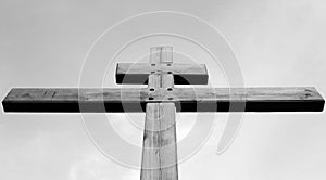 Wooden cross against the sky.