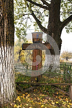 Wooden cross . Belarus