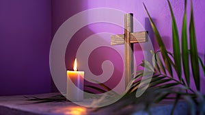 Wooden cross, candle and palm leaves on purple background