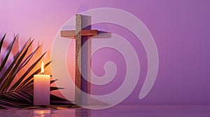 Wooden cross, candle and palm leaves on purple background