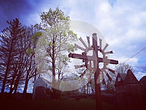 Wooden cross in the church yard