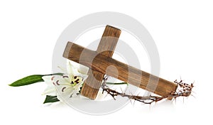 Wooden cross, crown of thorns and blossom lilies