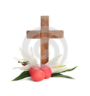 Wooden cross, Easter eggs and blossom lilies