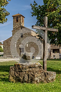 Wooden cross in front of the ancient Pieve di San Romolo, Gaville, Figline Valdarno, Italy