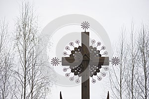 Wooden cross on gloomy day