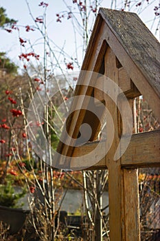 Wooden cross on a grave in a cemetery