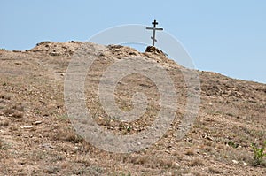 Wooden cross on the hill