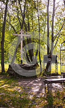 Wooden cross and icons of the memory of Grigory Rasputin and unfinished temple in the Alexander Park