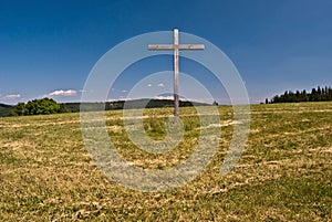 Wooden cross on Loucka hill in Slezske Beskydy mountains