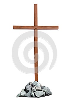 Wooden cross with pile of stones isolated on white