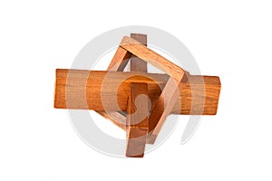 Wooden cross puzzle isolated on a white background