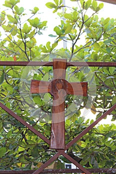 Wooden Cross on a Wooden Backdrop