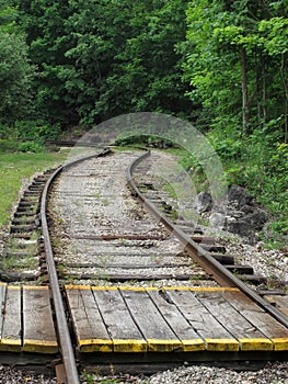 Wooden crossing over railroad tracks