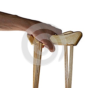 Wooden crutches. Medical assistance and rehabilitation. Isolated objects