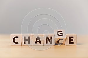 Wooden cube flip with word `change` to `chance`, Personal development and career growth or change yourself